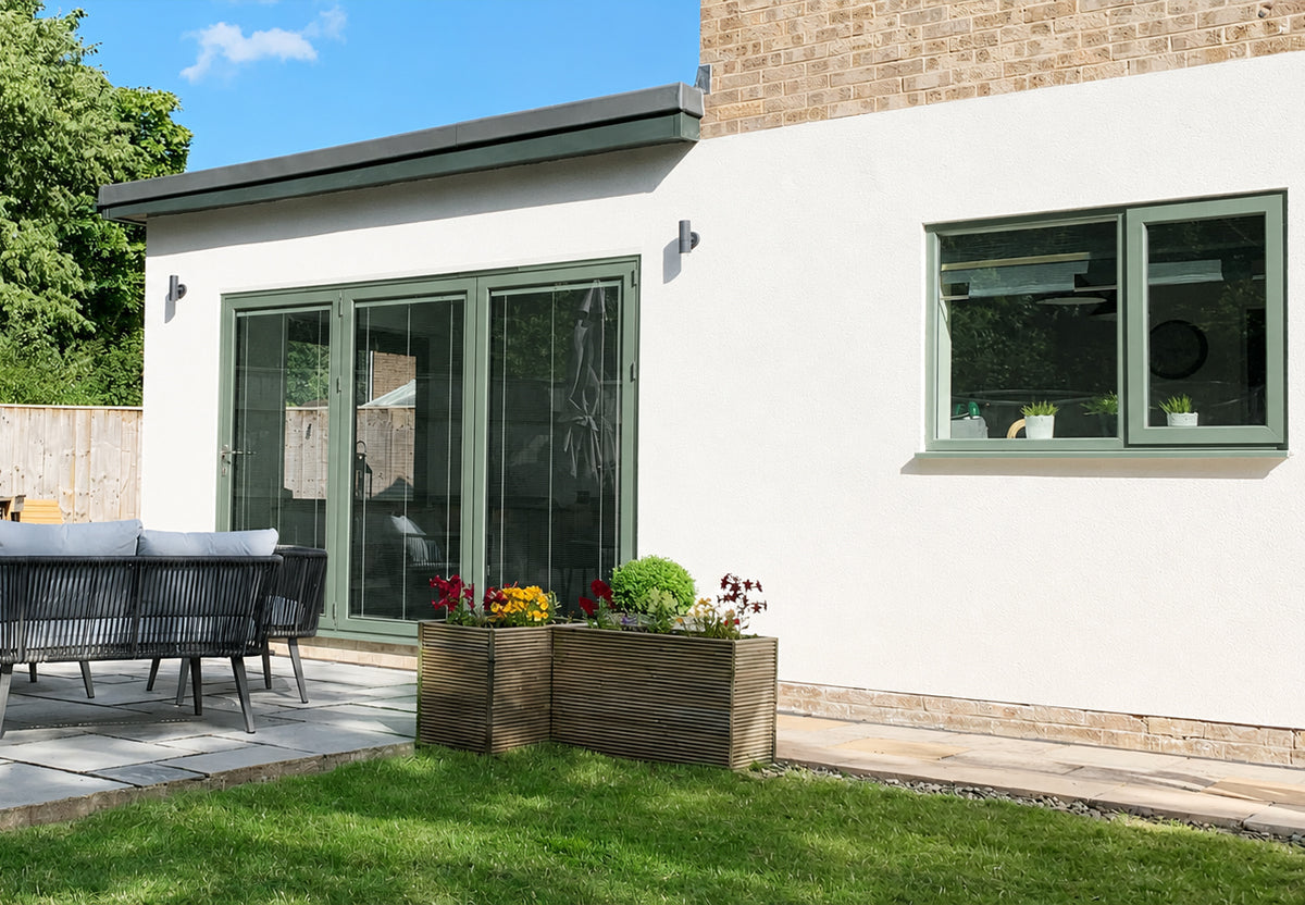 Bi-fold door and window with bespoke RAL colour frame